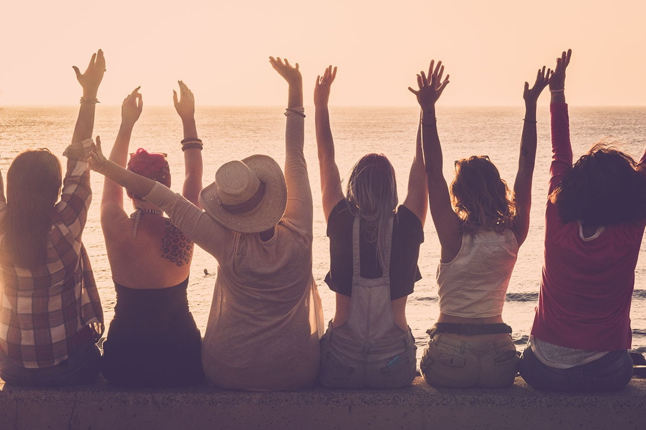 a group of women smiling